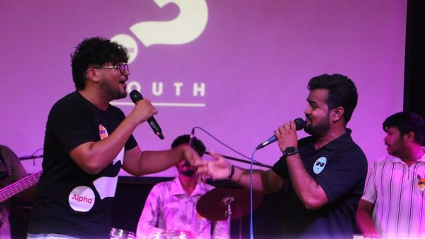 Young people singing at Monsoon Blast