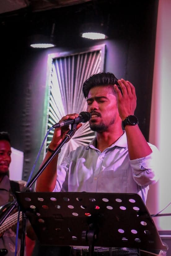 A young man singing