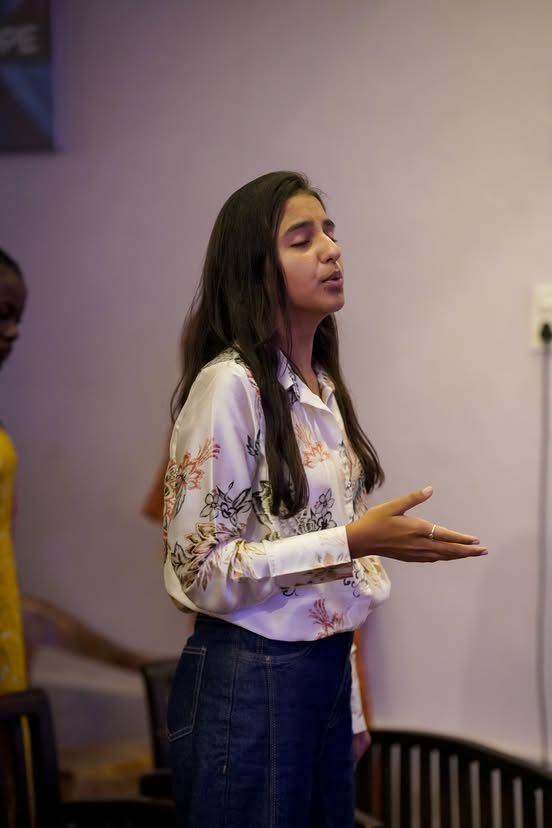 A young woman singing