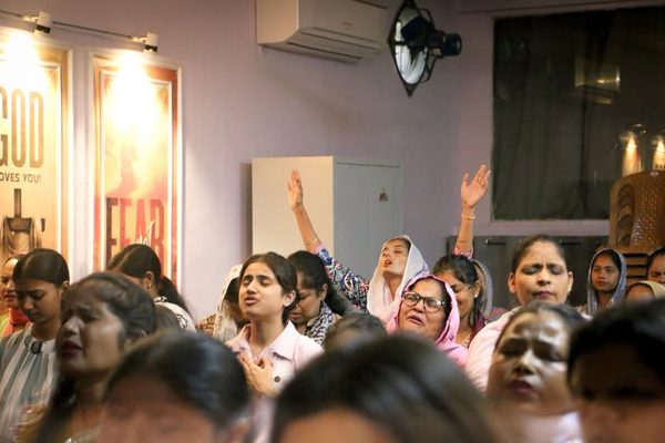 The congregation worshipping