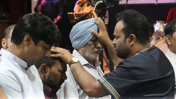 Praying for one another after the service