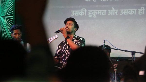 A young man singing